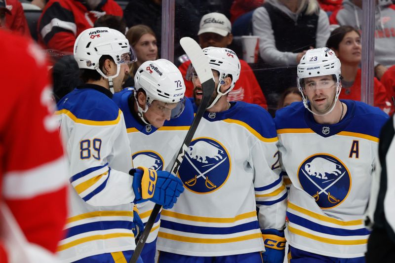 Nov 15, 2025; Detroit, Michigan, USA;  Buffalo Sabres center Tage Thompson (72) receives congratulations from teammates after scoring in the third period against the Detroit Red Wings at Little Caesars Arena. Mandatory Credit: Rick Osentoski-Imagn Images