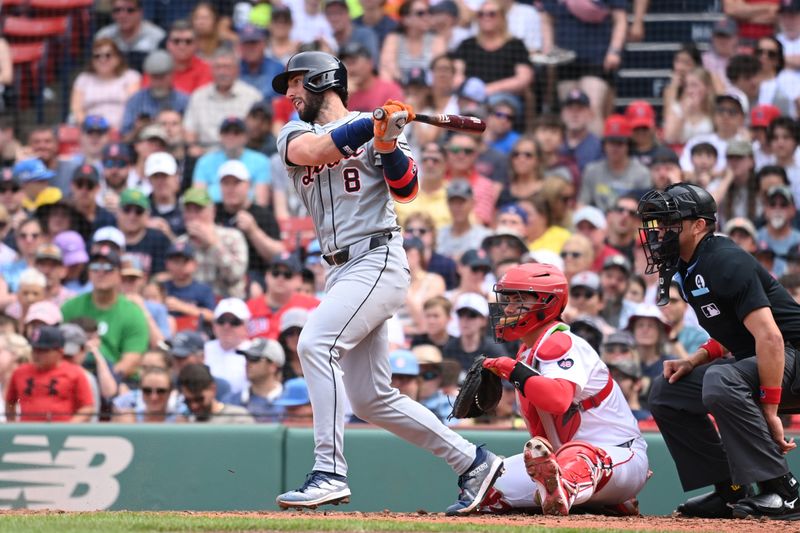 Jun 2, 2024; Boston, Massachusetts, USA;  Detroit Tigers third baseman Matt Vierling (8) hits a single against the Boston Red Sox during the seventh inning at Fenway Park. Mandatory Credit: Eric Canha-USA TODAY Sports