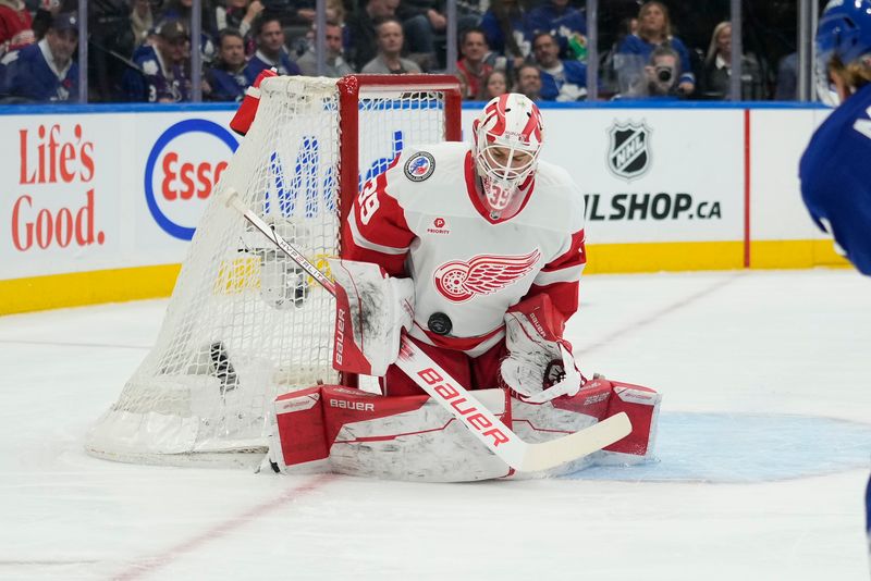 Nov 8, 2024; Toronto, Ontario, CAN; Detroit Red Wings goaltender Cam Talbot (39) makes a save against the Toronto Maple Leafs during the first period at Scotiabank Arena. Mandatory Credit: John E. Sokolowski-Imagn Images
