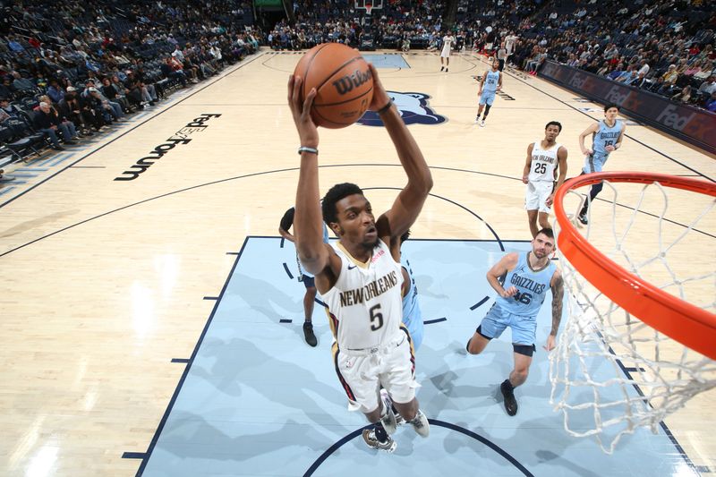 MEMPHIS, TN - FEBRUARY 12: Herb Jones #5 of the New Orleans Pelicans drives to the basket during the game against the Memphis Grizzlies on February 12, 2024 at FedExForum in Memphis, Tennessee. NOTE TO USER: User expressly acknowledges and agrees that, by downloading and or using this photograph, User is consenting to the terms and conditions of the Getty Images License Agreement. Mandatory Copyright Notice: Copyright 2024 NBAE (Photo by Joe Murphy/NBAE via Getty Images)