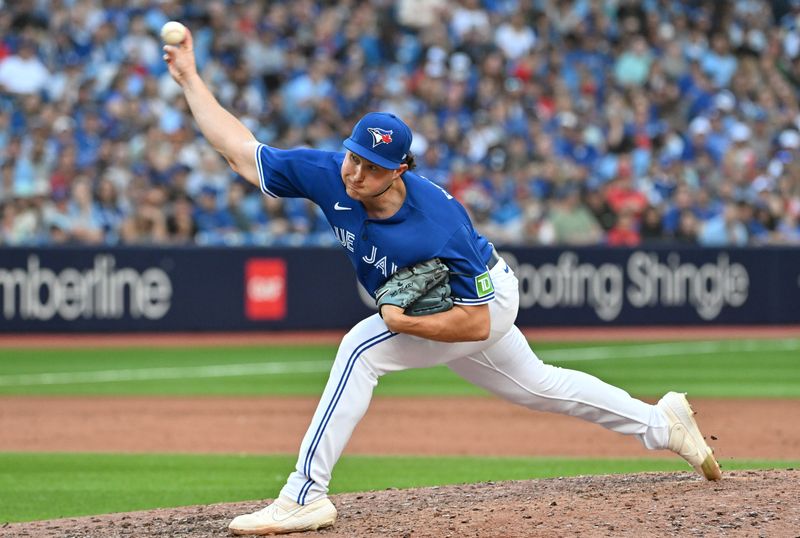 Jul 29, 2023; Toronto, Ontario, CAN;  Toronto Blue Jays relief pitcher Nate Pearson (24) delivers against the Los Angeles Angels in the eighth inning at Rogers Centre. Mandatory Credit: Dan Hamilton-USA TODAY Sports