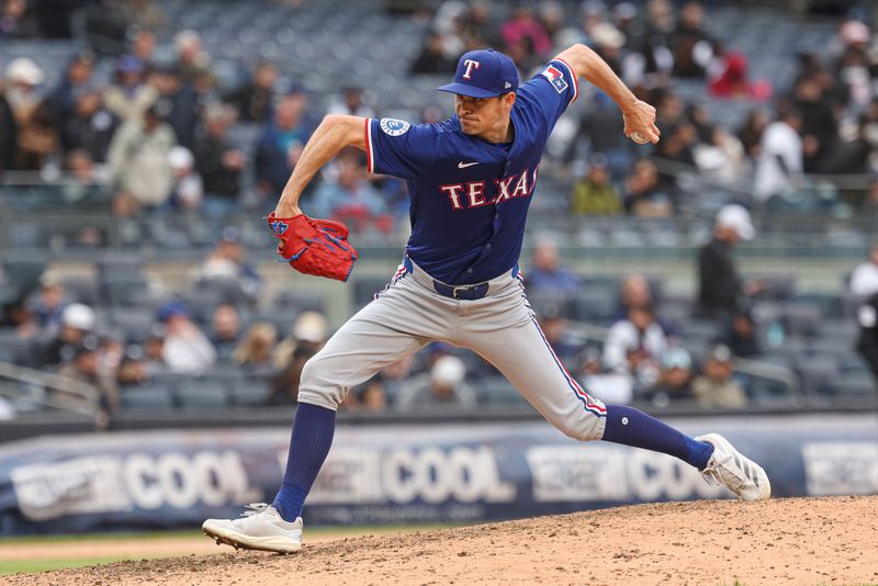 May 22, 2025; Bronx, New York, USA; Texas Rangers relief pitcher Hoby Milner (41) delivers a pitch during the seventh inning against the New York Yankees at Yankee Stadium. Mandatory Credit: Vincent Carchietta-Imagn Images
