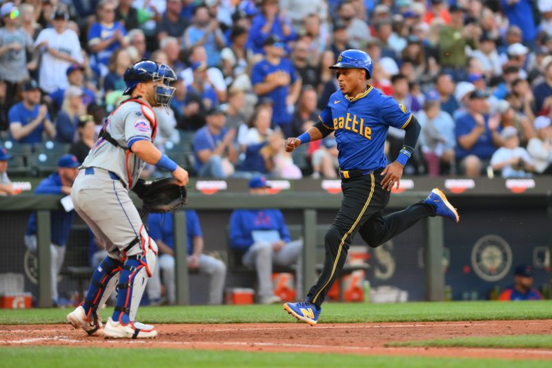 Aug 11, 2024; Seattle, Washington, USA; Seattle Mariners second baseman Jorge Polanco (7) scores a run against the New York Mets during the sixth inning at T-Mobile Park. Mandatory Credit: Steven Bisig-USA TODAY Sports