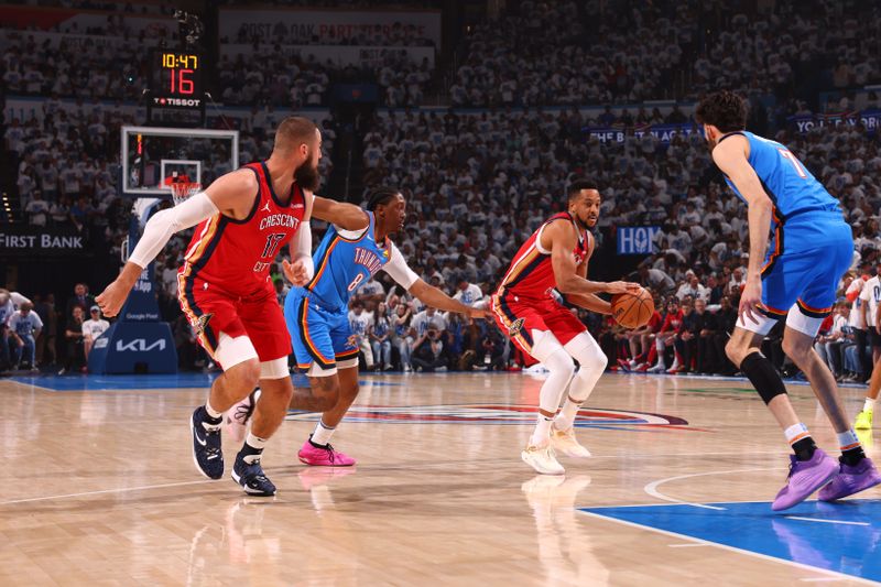 OKLAHOMA CITY, OK - APRIL 24: CJ McCollum #3 of the New Orleans Pelicans looks to pass the ball during the game against the Oklahoma City Thunder during Round 1 Game 2 of the 2024 NBA Playoffs on April 24, 2024 at Paycom Arena in Oklahoma City, Oklahoma. NOTE TO USER: User expressly acknowledges and agrees that, by downloading and or using this photograph, User is consenting to the terms and conditions of the Getty Images License Agreement. Mandatory Copyright Notice: Copyright 2024 NBAE (Photo by Zach Beeker/NBAE via Getty Images)