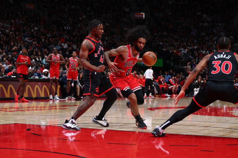 TORONTO, CANADA - JANUARY 31:  Coby White #0 of the Chicago Bulls dribbles the ball during the game against the Toronto Raptors on January 31, 2025 at the Scotiabank Arena in Toronto, Ontario, Canada.  NOTE TO USER: User expressly acknowledges and agrees that, by downloading and or using this Photograph, user is consenting to the terms and conditions of the Getty Images License Agreement.  Mandatory Copyright Notice: Copyright 2025 NBAE (Photo by Vaughn Ridley/NBAE via Getty Images)