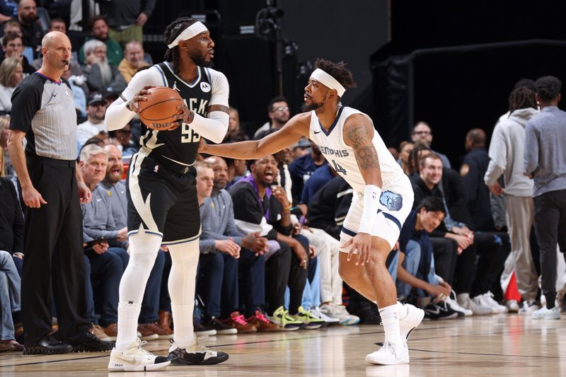 MEMPHIS, TN - FEBRUARY 15: Jordan Goodwin #4 of the Memphis Grizzlies plays defense during the game against the Milwaukee Bucks on February 15, 2024 at FedExForum in Memphis, Tennessee. NOTE TO USER: User expressly acknowledges and agrees that, by downloading and or using this photograph, User is consenting to the terms and conditions of the Getty Images License Agreement. Mandatory Copyright Notice: Copyright 2024 NBAE (Photo by Stephen Gosling/NBAE via Getty Images)