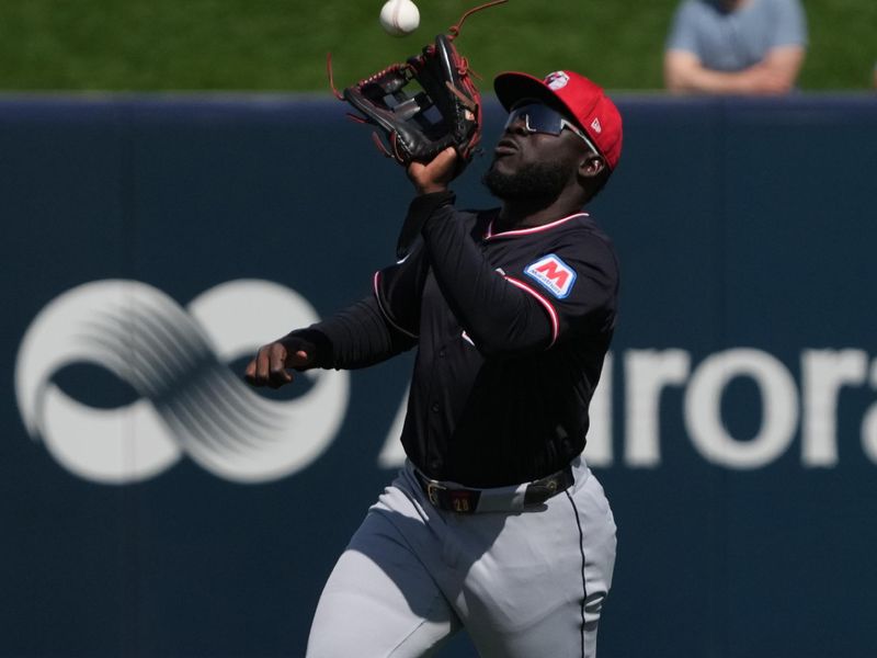 Mar 16, 2025; Phoenix, Arizona, USA; Cleveland Guardians outfielder Jhonkensy Noel (43) makes the running catch against the Milwaukee Brewers in the second inning at American Family Fields of Phoenix. Mandatory Credit: Rick Scuteri-Imagn Images