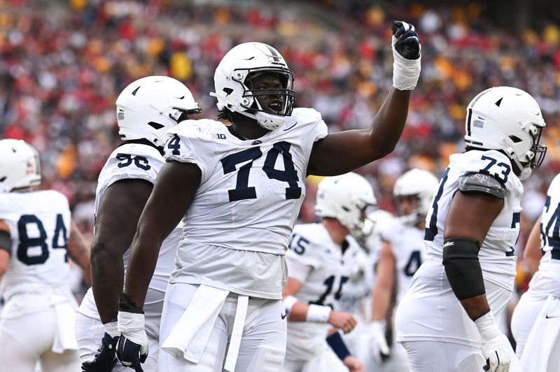 Nov 4, 2023; College Park, Maryland, USA;  Penn State Nittany Lions offensive lineman Olumuyiwa Fashanu (74) celebrates after a first half touchdown against the Maryland Terrapins at SECU Stadium. Mandatory Credit: Tommy Gilligan-USA TODAY Sports