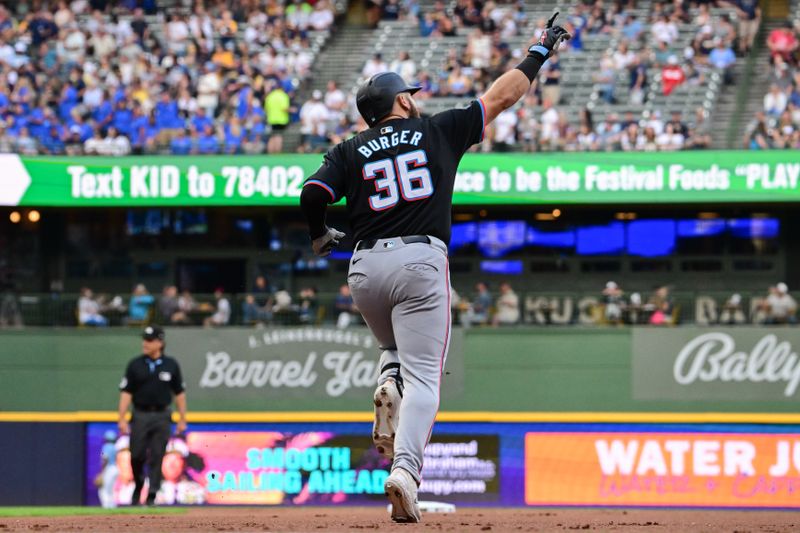 Jul 26, 2024; Milwaukee, Wisconsin, USA;  Miami Marlins third baseman Jake Burger (36) reacts after hitting a solo home run in the first inning against the Milwaukee Brewers at American Family Field. Mandatory Credit: Benny Sieu-USA TODAY Sports