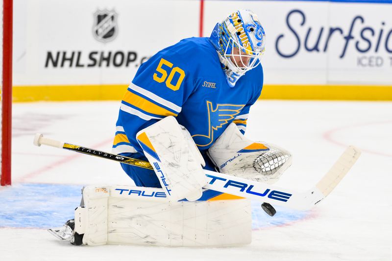 Oct 2, 2025; St. Louis, Missouri, USA; St. Louis Blues goaltender Jordan Binnington (50) defends the net against the Ottawa Senators during the first period at Enterprise Center. Mandatory Credit: Jeff Curry-Imagn Images