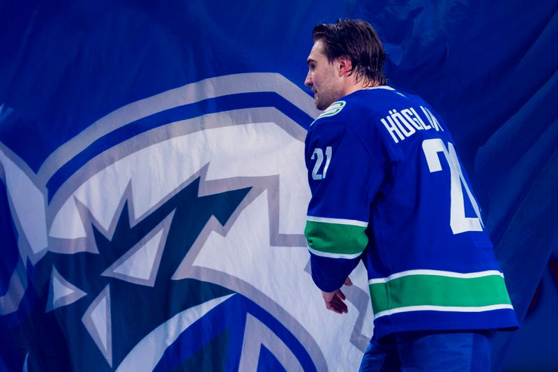 Mar 15, 2025; Vancouver, British Columbia, CAN; Vancouver Canucks forward Nils Hoglander (21) skates out as the game’s third star against the Chicago Blackhawks at Rogers Arena. Mandatory Credit: Bob Frid-Imagn Images