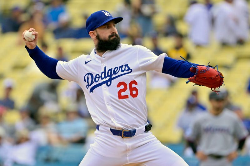 Apr 30, 2025; Los Angeles, California, USA; Los Angeles Dodgers starting pitcher Tony Gonsolin (26) pitches against the Miami Marlins during the first inning at Dodger Stadium. Mandatory Credit: Jayne Kamin-Oncea-Imagn Images