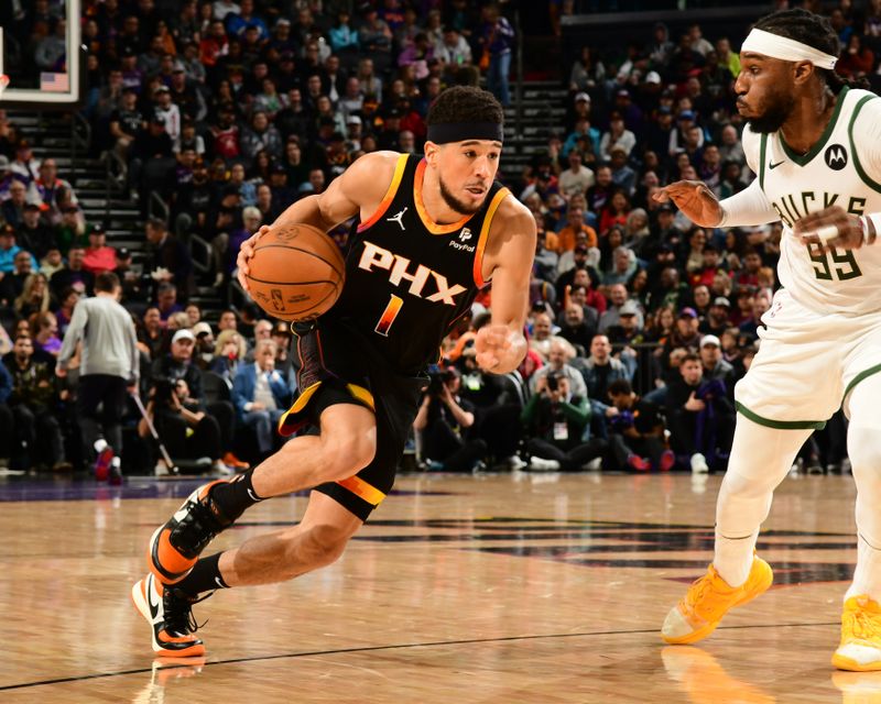 PHOENIX, AZ - FEBRUARY 6: Devin Booker #1 of the Phoenix Suns dribbles the ball during the game against the Milwaukee Bucks on February 6, 2024 at Footprint Center in Phoenix, Arizona. NOTE TO USER: User expressly acknowledges and agrees that, by downloading and or using this photograph, user is consenting to the terms and conditions of the Getty Images License Agreement. Mandatory Copyright Notice: Copyright 2024 NBAE (Photo by Kate Frese/NBAE via Getty Images)