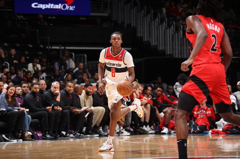 WASHINGTON, DC -? OCTOBER 11: Carlton Carrington #8 of the Washington Wizards dribbles the ball during the game against the Toronto Raptors during a NBA preseason game on October 11, 2024 at Capital One Arena in Washington, DC. NOTE TO USER: User expressly acknowledges and agrees that, by downloading and or using this Photograph, user is consenting to the terms and conditions of the Getty Images License Agreement. Mandatory Copyright Notice: Copyright 2024 NBAE (Photo by Stephen Gosling/NBAE via Getty Images)