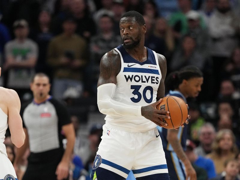 MINNEAPOLIS, MN -  JANUARY 11: Julius Randle #30 of the Minnesota Timberwolves looks to pass the ball during the game against the Memphis Grizzlies on January 11, 2025 at Target Center in Minneapolis, Minnesota. NOTE TO USER: User expressly acknowledges and agrees that, by downloading and or using this Photograph, user is consenting to the terms and conditions of the Getty Images License Agreement. Mandatory Copyright Notice: Copyright 2025 NBAE (Photo by Jordan Johnson/NBAE via Getty Images)