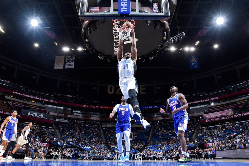 ORLANDO, FL - OCTOBER 18: Wendell Carter Jr. #34 of the Orlando Magic dunks the ball during the game against the Philadelphia 76ers during a NBA preseason game on October 18, 2024 at Kia Center in Orlando, Florida. NOTE TO USER: User expressly acknowledges and agrees that, by downloading and or using this photograph, User is consenting to the terms and conditions of the Getty Images License Agreement. Mandatory Copyright Notice: Copyright 2024 NBAE (Photo by Fernando Medina/NBAE via Getty Images)