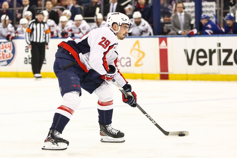 Apr 21, 2024; New York, New York, USA; Washington Capitals center Hendrix Lapierre (29) controls the puck against the New York Rangers in game one of the first round of the 2024 Stanley Cup Playoffs at Madison Square Garden. Mandatory Credit: Wendell Cruz-USA TODAY Sports