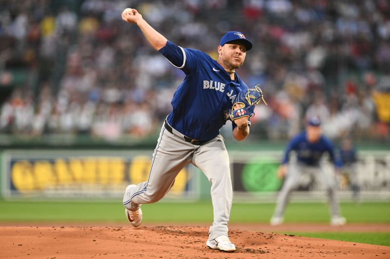 Aug 27, 2024; Boston, Massachusetts, USA; Toronto Blue Jays starting pitcher Yariel Rodriguez (29) pitches against the Boston Red Sox during the first inning at Fenway Park. Mandatory Credit: Brian Fluharty-USA TODAY Sports