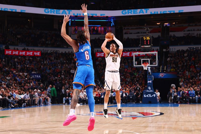 OKLAHOMA CITY, OK - JANUARY 31: Aaron Gordon #50 of the Denver Nuggets shoots a three point basket during the game against the Oklahoma City Thunder on January 31, 2024 at Paycom Arena in Oklahoma City, Oklahoma. NOTE TO USER: User expressly acknowledges and agrees that, by downloading and or using this photograph, User is consenting to the terms and conditions of the Getty Images License Agreement. Mandatory Copyright Notice: Copyright 2024 NBAE (Photo by Zach Beeker/NBAE via Getty Images)