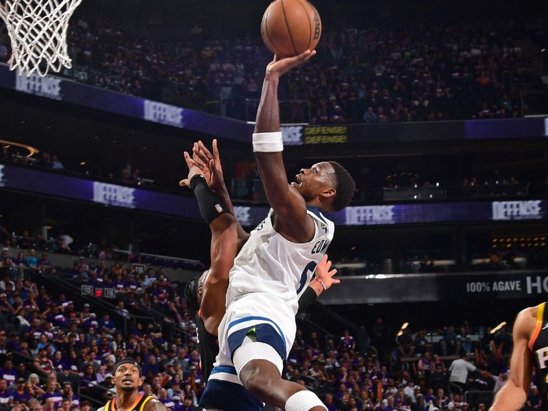 PHOENIX, AZ - APRIL  26: Anthony Edwards #5 of the Minnesota Timberwolves drives to the basket during the game against the Phoenix Suns on April 26, 2024 at Footprint Center in Phoenix, Arizona. NOTE TO USER: User expressly acknowledges and agrees that, by downloading and or using this photograph, user is consenting to the terms and conditions of the Getty Images License Agreement. Mandatory Copyright Notice: Copyright 2024 NBAE (Photo by Kate Frese/NBAE via Getty Images)