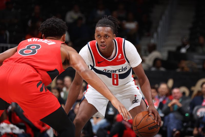 WASHINGTON, DC -? OCTOBER 11: Carlton Carrington #8 of the Washington Wizards dribbles the ball during the game against the Toronto Raptors during a NBA preseason game on October 11, 2024 at Capital One Arena in Washington, DC. NOTE TO USER: User expressly acknowledges and agrees that, by downloading and or using this Photograph, user is consenting to the terms and conditions of the Getty Images License Agreement. Mandatory Copyright Notice: Copyright 2024 NBAE (Photo by Stephen Gosling/NBAE via Getty Images)