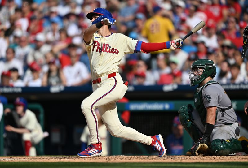 Jul 13, 2024; Philadelphia, Pennsylvania, USA; Philadelphia Phillies shortstop Trea Turner (7) hits a two-run home run against the Oakland Athletics in the fourth inning at Citizens Bank Park. Mandatory Credit: Kyle Ross-USA TODAY Sports