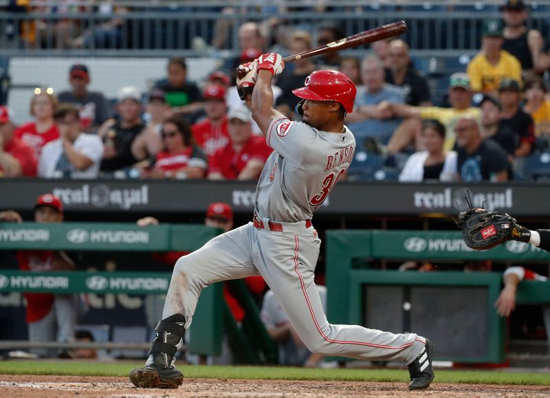 Aug 13, 2023; Pittsburgh, PA, USA; Cincinnati Reds left fielder Will Benson (30) hits a single against the Pittsburgh Pirates during the sixth inning at PNC Park. Mandatory Credit: Charles LeClaire-USA TODAY Sports