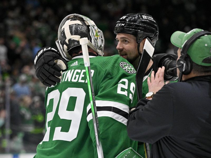 Jan 25, 2024; Dallas, Texas, USA; Dallas Stars goaltender Jake Oettinger (29) and left wing Jamie Benn (14) celebrate after defenseman Thomas Harley (not pictured) scores the game winning as the Stars defeat the Anaheim Ducks in the overtime period at the American Airlines Center. Mandatory Credit: Jerome Miron-USA TODAY Sports