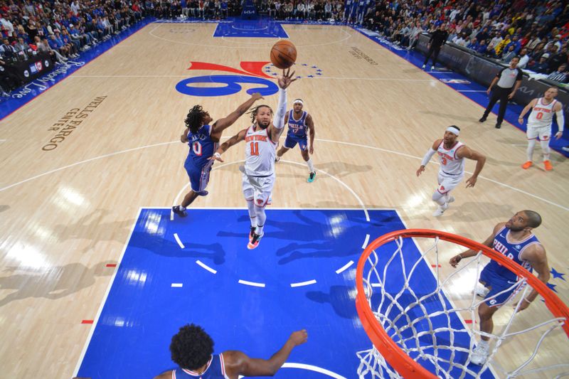 PHILADELPHIA, PA - APRIL 25: Jalen Brunson #11 of the New York Knicks drives to the basket during the game against the Philadelphia 76ers during Round 1 Game 3 of the 2024 NBA Playoffs on April 25, 2024 at the Wells Fargo Center in Philadelphia, Pennsylvania NOTE TO USER: User expressly acknowledges and agrees that, by downloading and/or using this Photograph, user is consenting to the terms and conditions of the Getty Images License Agreement. Mandatory Copyright Notice: Copyright 2024 NBAE (Photo by Jesse D. Garrabrant/NBAE via Getty Images)