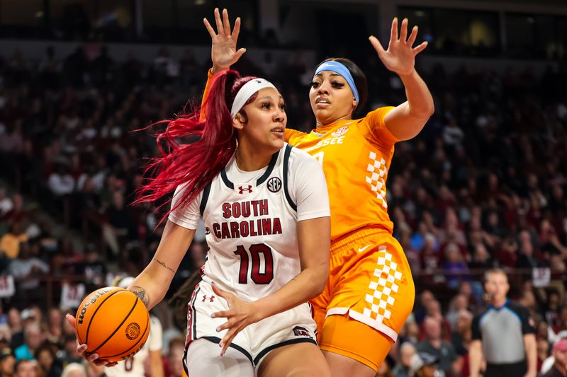 Mar 3, 2024; Columbia, South Carolina, USA; South Carolina Gamecocks center Kamilla Cardoso (10) looks to shoot over Tennessee Lady Vols center Tamari Key (20) in the first half at Colonial Life Arena. Mandatory Credit: Jeff Blake-USA TODAY Sports