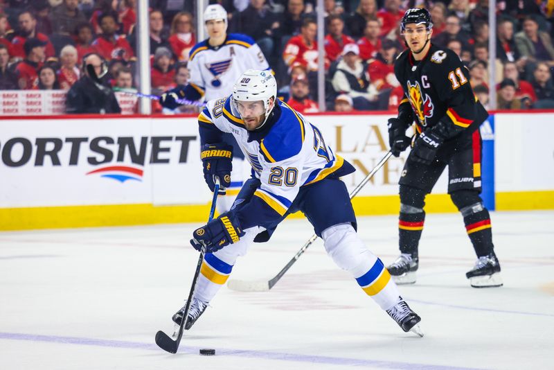 Jan 23, 2024; Calgary, Alberta, CAN; St. Louis Blues left wing Brandon Saad (20) scores a goal against the Calgary Flames during the third period at Scotiabank Saddledome. Mandatory Credit: Sergei Belski-USA TODAY Sports