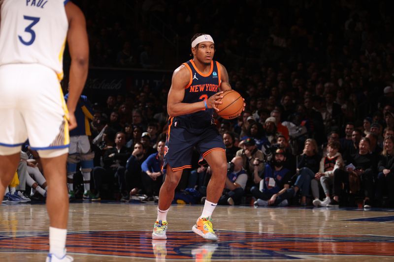 NEW YORK, NY - FEBRUARY 29: Miles McBride #2 of the New York Knicks looks to pass the ball during the game against the Golden State Warriors on January 29, 2024 at Madison Square Garden in New York City, New York.  NOTE TO USER: User expressly acknowledges and agrees that, by downloading and or using this photograph, User is consenting to the terms and conditions of the Getty Images License Agreement. Mandatory Copyright Notice: Copyright 2024 NBAE  (Photo by Nathaniel S. Butler/NBAE via Getty Images)