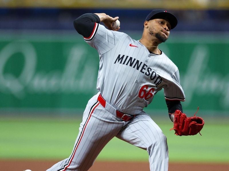 Sep 2, 2024; St. Petersburg, Florida, USA; Minnesota Twins pitcher Jorge Alcala (66) throws a pitch against the Tampa Bay Rays in the fifth inning at Tropicana Field. Mandatory Credit: Nathan Ray Seebeck-USA TODAY Sports