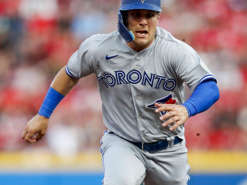 Aug 19, 2023; Cincinnati, Ohio, USA; Toronto Blue Jays center fielder Daulton Varsho (25) scores in the fourth inning against the Cincinnati Reds at Great American Ball Park. Mandatory Credit: Katie Stratman-USA TODAY Sports