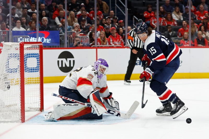 Nov 8, 2023; Washington, District of Columbia, USA; Florida Panthers goaltender Sergei Bobrovsky (72) makes a save in front of Washington Capitals left wing Sonny Milano (15) in the third period at Capital One Arena. Mandatory Credit: Geoff Burke-USA TODAY Sports