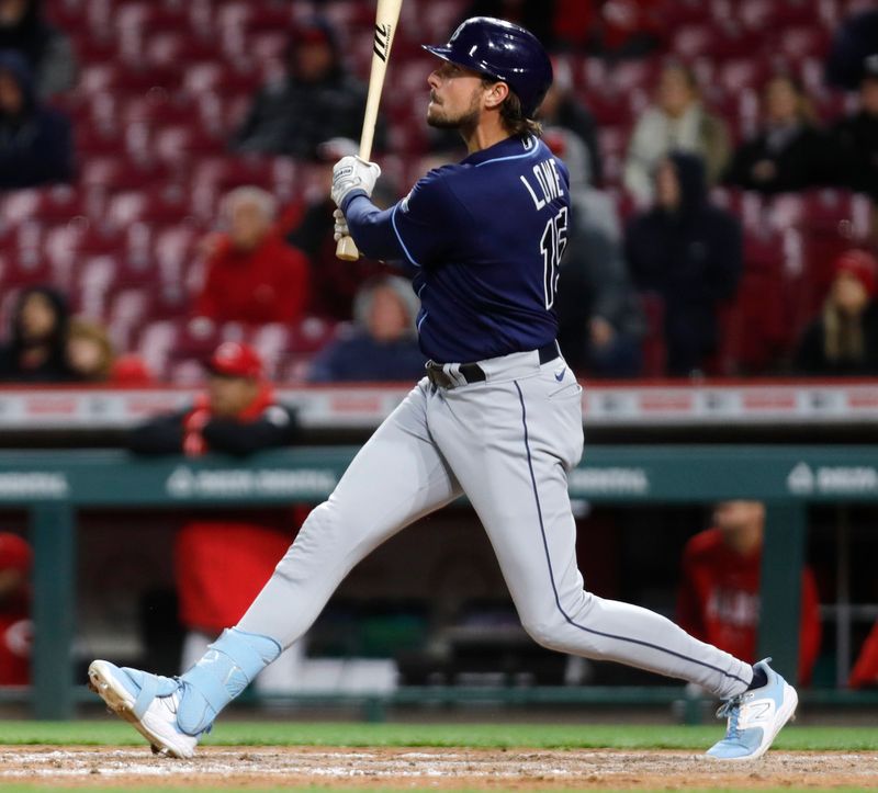 Apr 17, 2023; Cincinnati, Ohio, USA; Tampa Bay Rays right fielder Josh Lowe (15) hits a solo home run against the Cincinnati Reds during the ninth inning at Great American Ball Park. Mandatory Credit: David Kohl-USA TODAY Sports