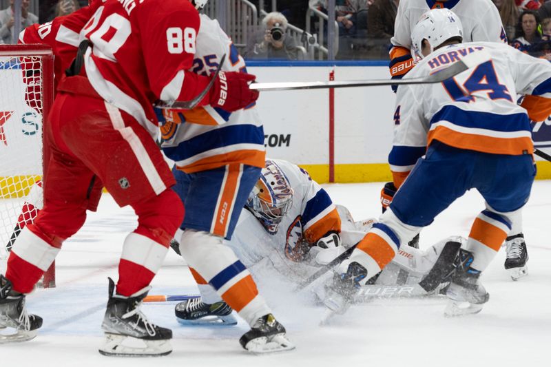 Oct 30, 2023; Elmont, New York, USA; New York Islanders goaltender Ilya Sorokin (30) covers up the puck after a shot by the Detroit Red Wings during the first period at UBS Arena. Mandatory Credit: Thomas Salus-USA TODAY Sports