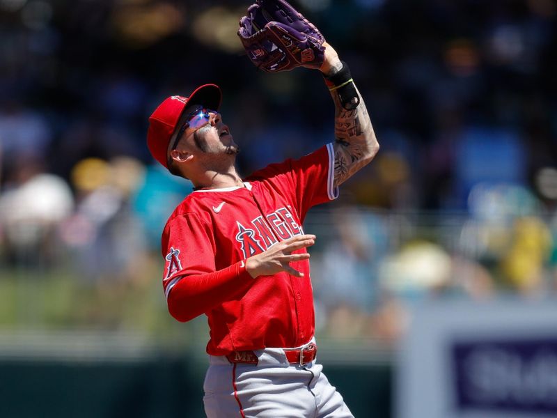 May 22, 2025; West Sacramento, California, USA; Los Angeles Angels shortstop Zach Neto (9) catches a pop up for an out during the fifth inning against the Athletics at Sutter Health Park. Mandatory Credit: Sergio Estrada-Imagn Images