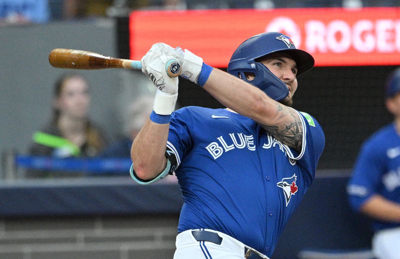 Jul 2, 2024; Toronto, Ontario, CAN;  Toronto Blue Jays second baseman Spencer Horwitz (48) hits a solo home run against the Houston Astros in the third inning at Rogers Centre. Mandatory Credit: Dan Hamilton-USA TODAY Sports