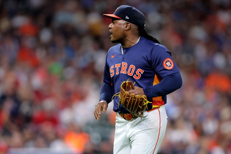 Jun 24, 2025; Houston, Texas, USA; Houston Astros starting pitcher Framber Valdez (59) reacts after retiring the side against the Philadelphia Phillies during the seventh inning at Daikin Park. Mandatory Credit: Erik Williams-Imagn Images