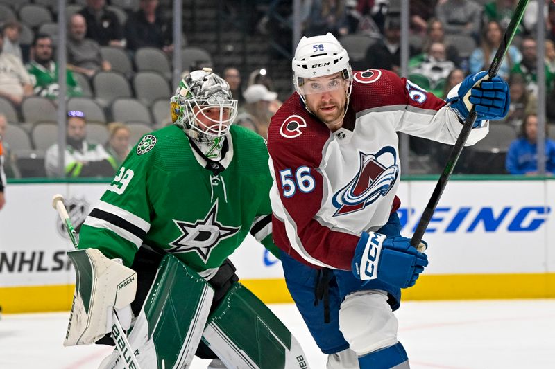 Oct 3, 2022; Dallas, Texas, USA; Dallas Stars goaltender Jake Oettinger (29) and Colorado Avalanche defenseman Kurtis MacDermid (56) look for the puck in the Stars zone during the third period at the American Airlines Center. Mandatory Credit: Jerome Miron-USA TODAY Sports