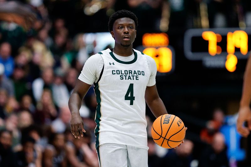 Feb 17, 2024; Fort Collins, Colorado, USA; Colorado State Rams guard Isaiah Stevens (4) controls the ball in the second half against the Utah State Aggies at Moby Arena. Mandatory Credit: Isaiah J. Downing-USA TODAY Sports