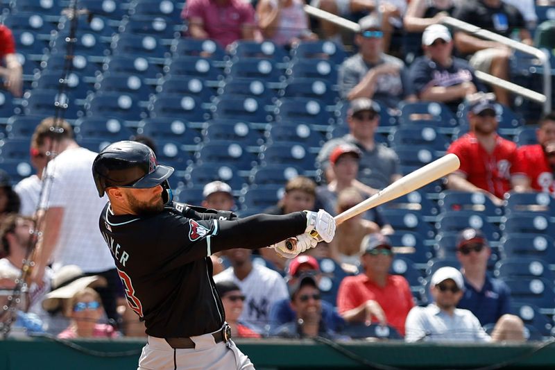 Jun 20, 2024; Washington, District of Columbia, USA; Arizona Diamondbacks first baseman Christian Walker (53) hits a solo home run against the Washington Nationals during the ninth inning at Nationals Park. Mandatory Credit: Geoff Burke-USA TODAY Sports