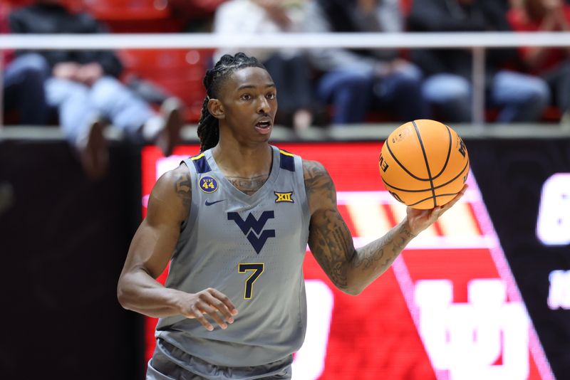 Mar 4, 2025; Salt Lake City, Utah, USA; West Virginia Mountaineers guard Javon Small (7) brings the ball up the court against the Utah Utes during the first half at Jon M. Huntsman Center. Mandatory Credit: Rob Gray-Imagn Images