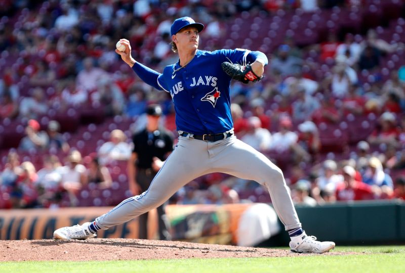 Aug 20, 2023; Cincinnati, Ohio, USA; Toronto Blue Jays relief pitcher Bowden Francis (44) throws against the Cincinnati Reds during the ninth inning at Great American Ball Park. Mandatory Credit: David Kohl-USA TODAY Sports