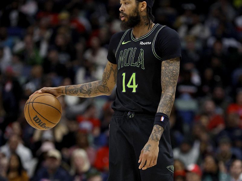 NEW ORLEANS, LOUISIANA - JANUARY 23: Brandon Ingram #14 of the New Orleans Pelicans dribbles the ball down court during the fourth quarter of an NBA game against the Utah Jazz at Smoothie King Center on January 23, 2024 in New Orleans, Louisiana. NOTE TO USER: User expressly acknowledges and agrees that, by downloading and or using this photograph, User is consenting to the terms and conditions of the Getty Images License Agreement. (Photo by Sean Gardner/Getty Images)