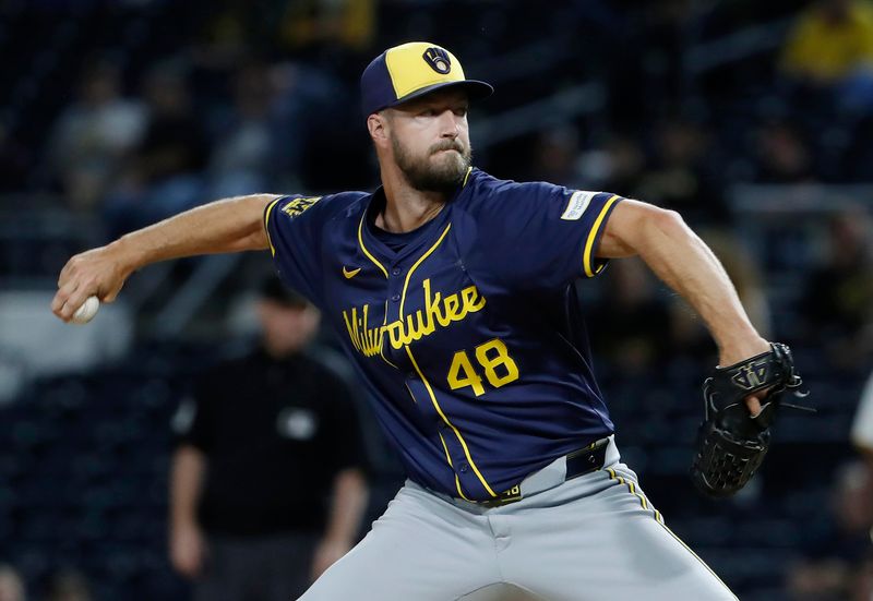 Sep 24, 2024; Pittsburgh, Pennsylvania, USA; Milwaukee Brewers relief pitcher Colin Rea (48) pitches against the Pittsburgh Pirates during the sixth inning at PNC Park. Mandatory Credit: Charles LeClaire-Imagn Images