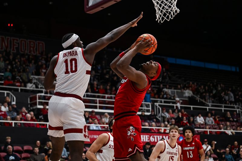 Jan 2, 2025; Stanford, California, USA;  Louisville Cardinals guard Ryan Conwell (3) shoots the ball over Stanford Cardinal forward Chisom Okpara (10) during the first half at Maples Pavilion. Mandatory Credit: Justine Willard-Imagn Images