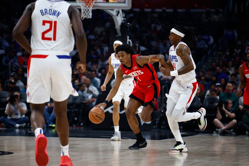 LOS ANGELES, CALIFORNIA - APRIL 14:  Amen Thompson #1 of the Houston Rockets in the first half at Crypto.com Arena on April 14, 2024 in Los Angeles, California.  NOTE TO USER: User expressly acknowledges and agrees that, by downloading and/or using this photograph, user is consenting to the terms and conditions of the Getty Images License Agreement.  (Photo by Ronald Martinez/Getty Images)