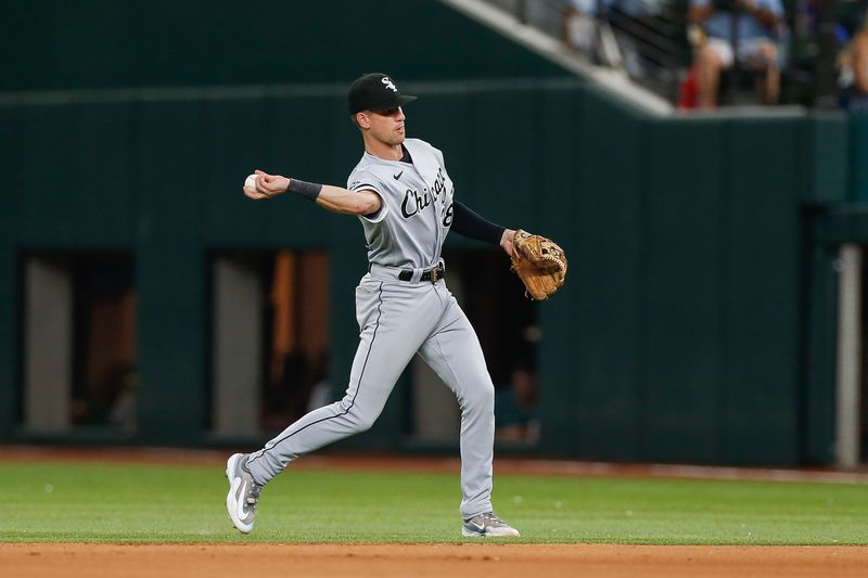 Aug 2, 2023; Arlington, Texas, USA; Chicago White Sox second baseman Zach Remillard (28) fields a ground ball during the seventh inning against the Texas Rangers at Globe Life Field. Mandatory Credit: Andrew Dieb-USA TODAY Sports